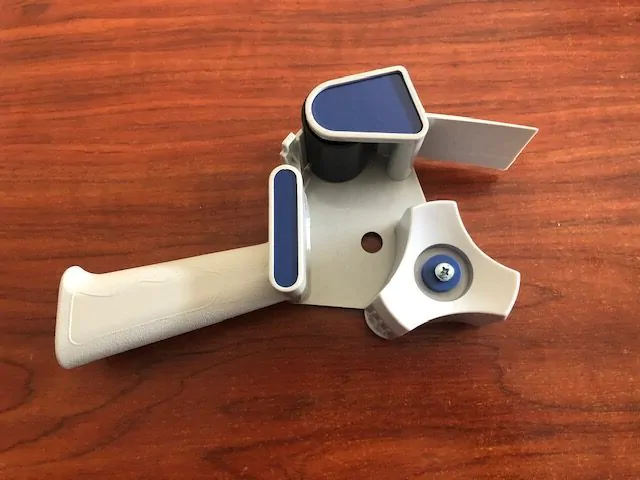 Dispensador de plástico para cinta de precinto